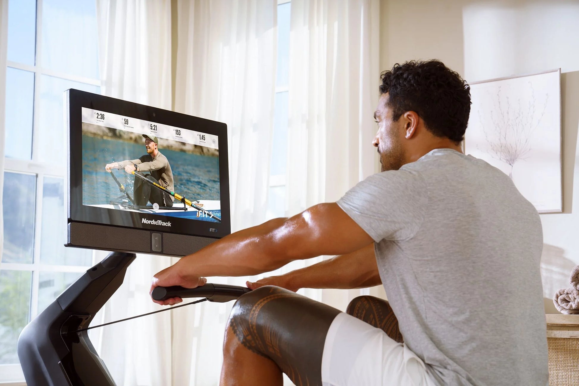 RW900; Ifit-Enabled Rower with 22 Inch Pivoting Touchscreen